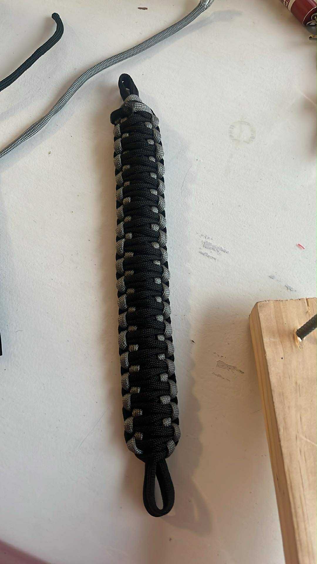 Paracord grab handle